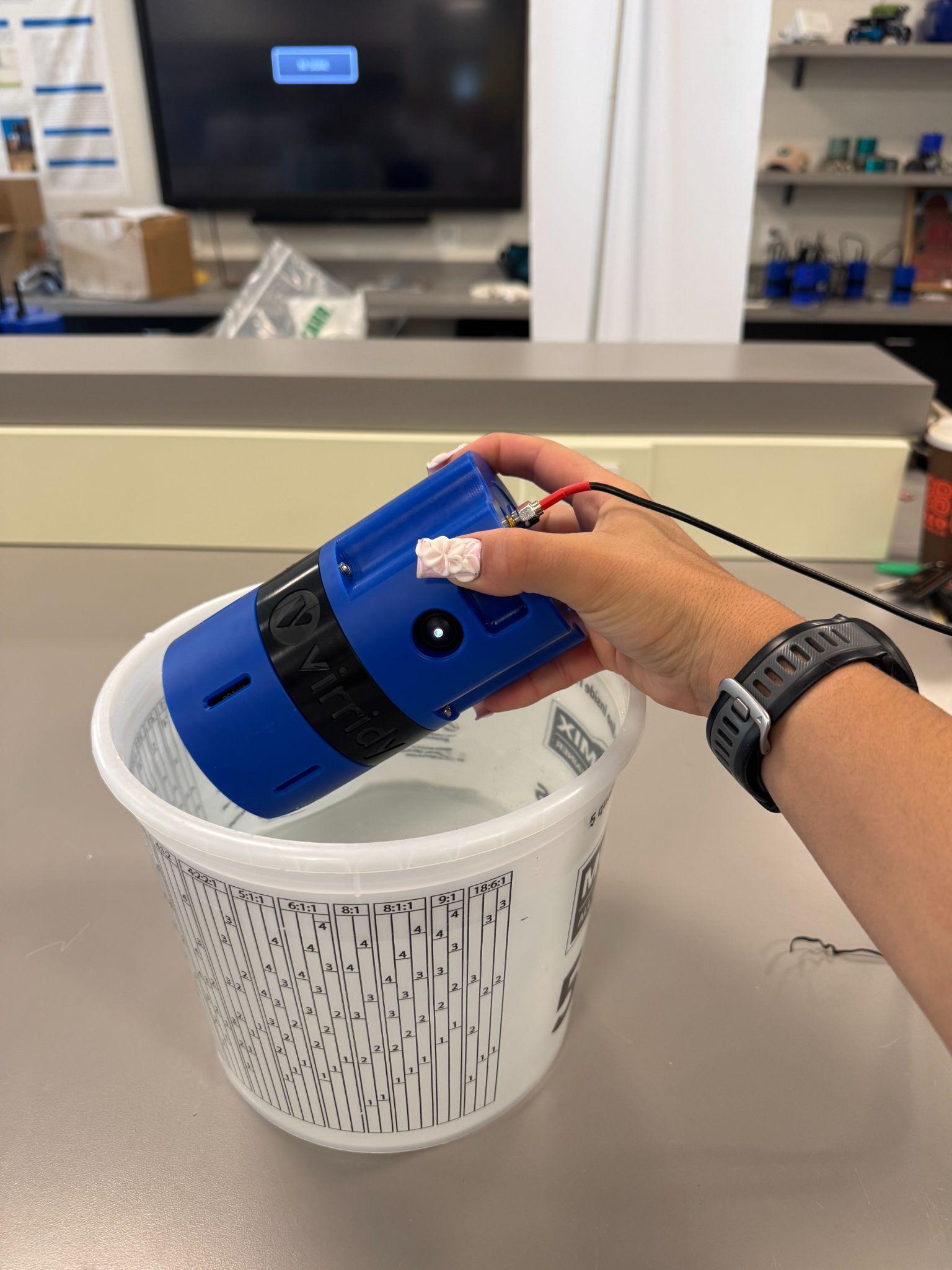 Sensor installed in bucket at 45 degree angle with wired antenna